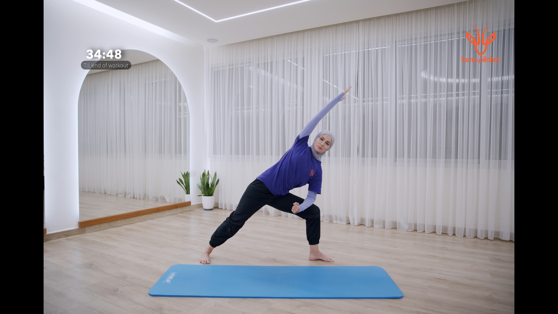 Lama teaching Pilates in episode 1