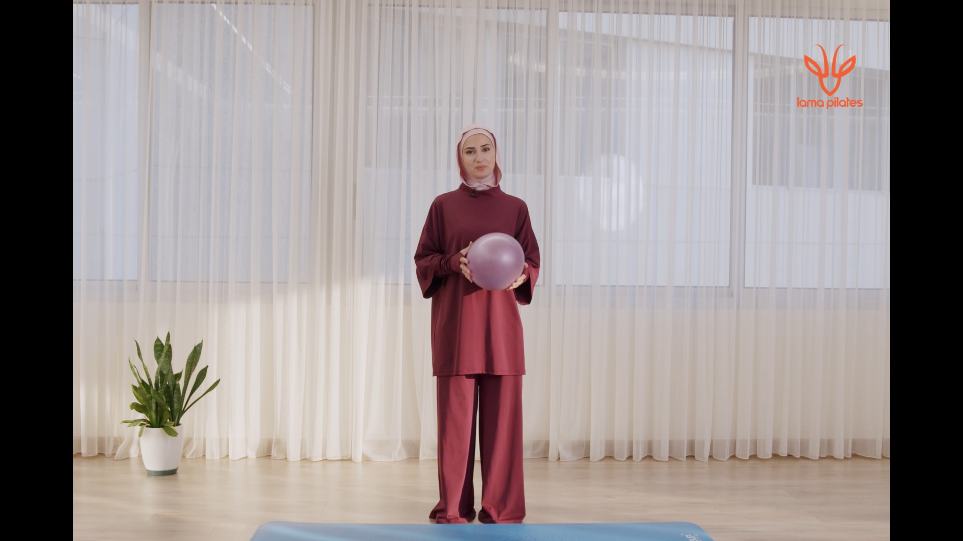 Lama teaching Pilates in episode 8